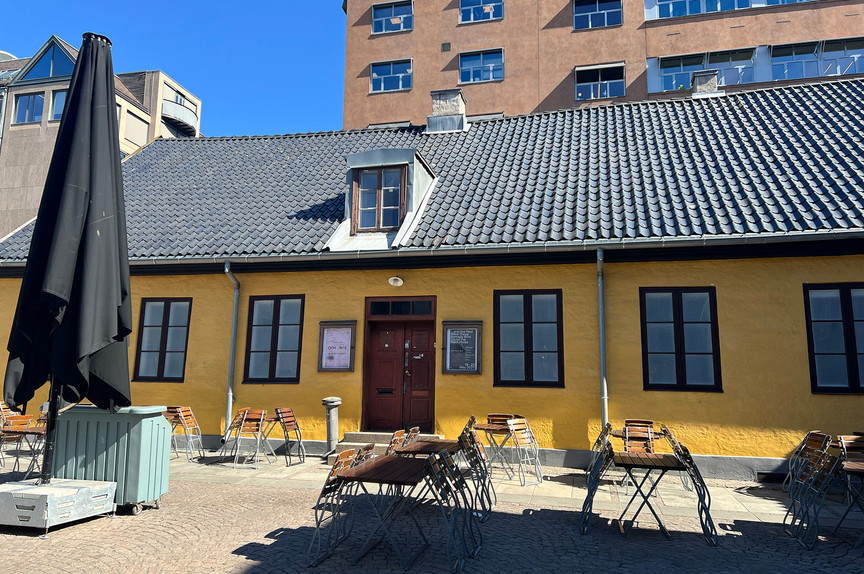 An old yellow building. 