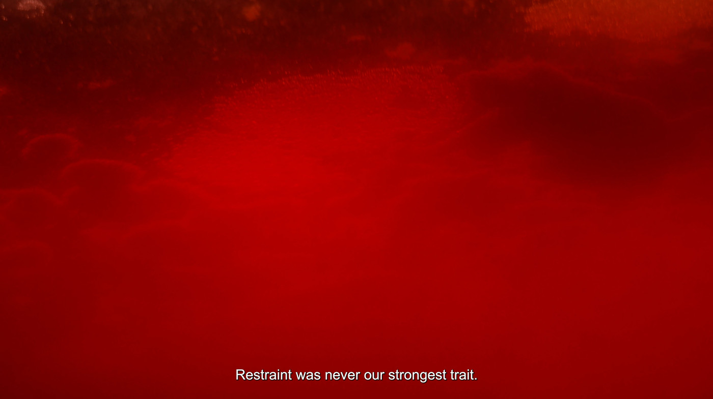 A red, empty, underwater landcape, perhaps from inside a brew. The subtitles reads: "Restraint was never our strongest trait."