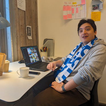 A man sitting at his desk