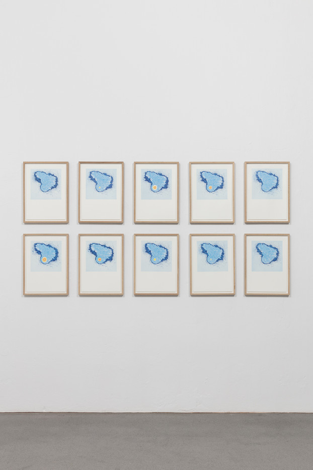 Installation view from exhibition, with 10 framed drawings made with colored pencil.  The drawings show an almost identical fog formation that is repeated, where a point inside the fog formation expands and contracts through the two rows of drawings.