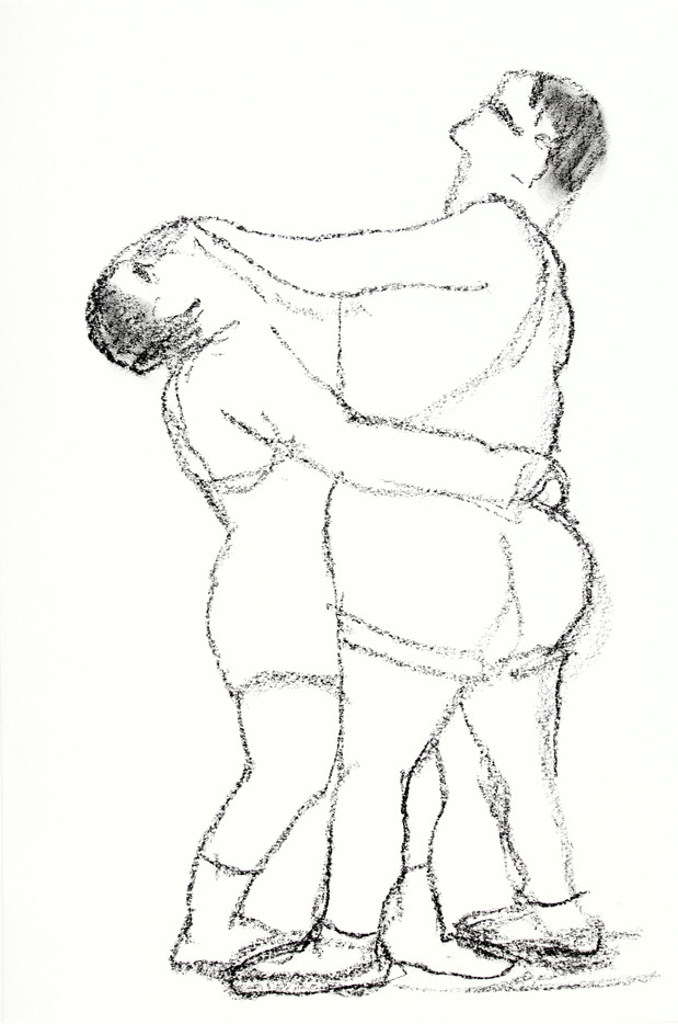 Two men fights to to get hold on the other, the larger seems to win