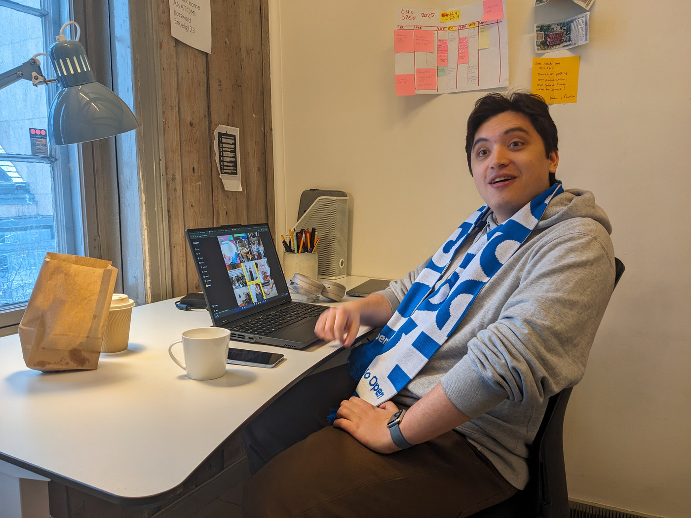 A man sitting at his desk